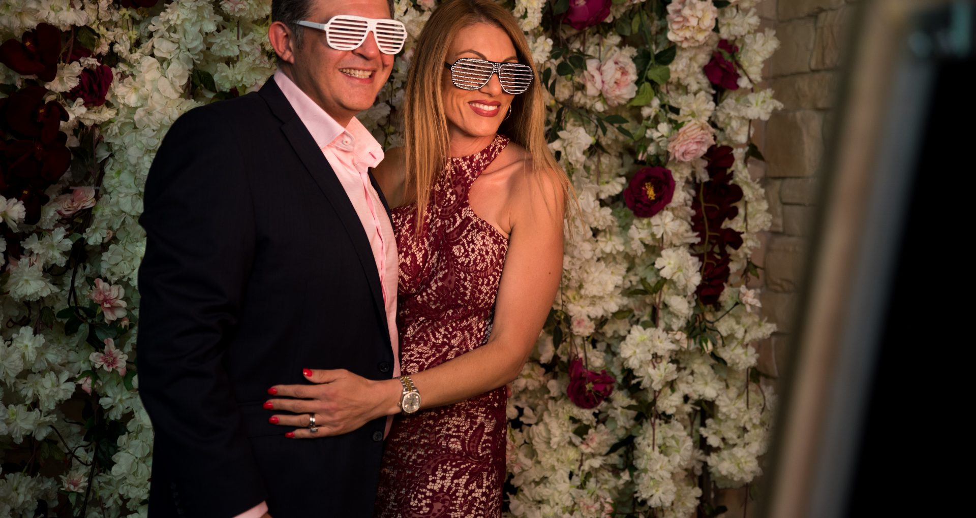 Image of a couple using a photo booth hire